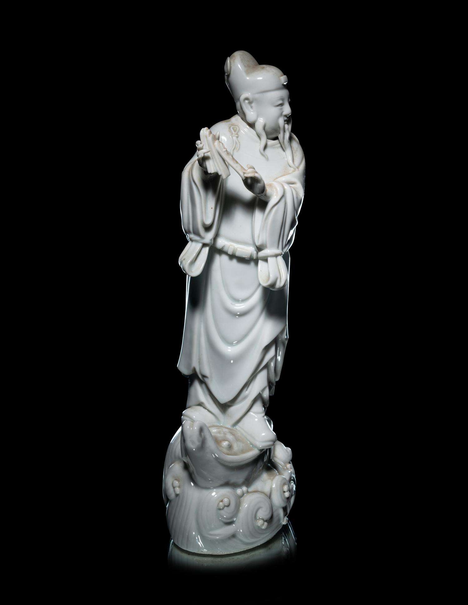 A Chinese Blanc-de-Chine Porcelain Figure of an Official