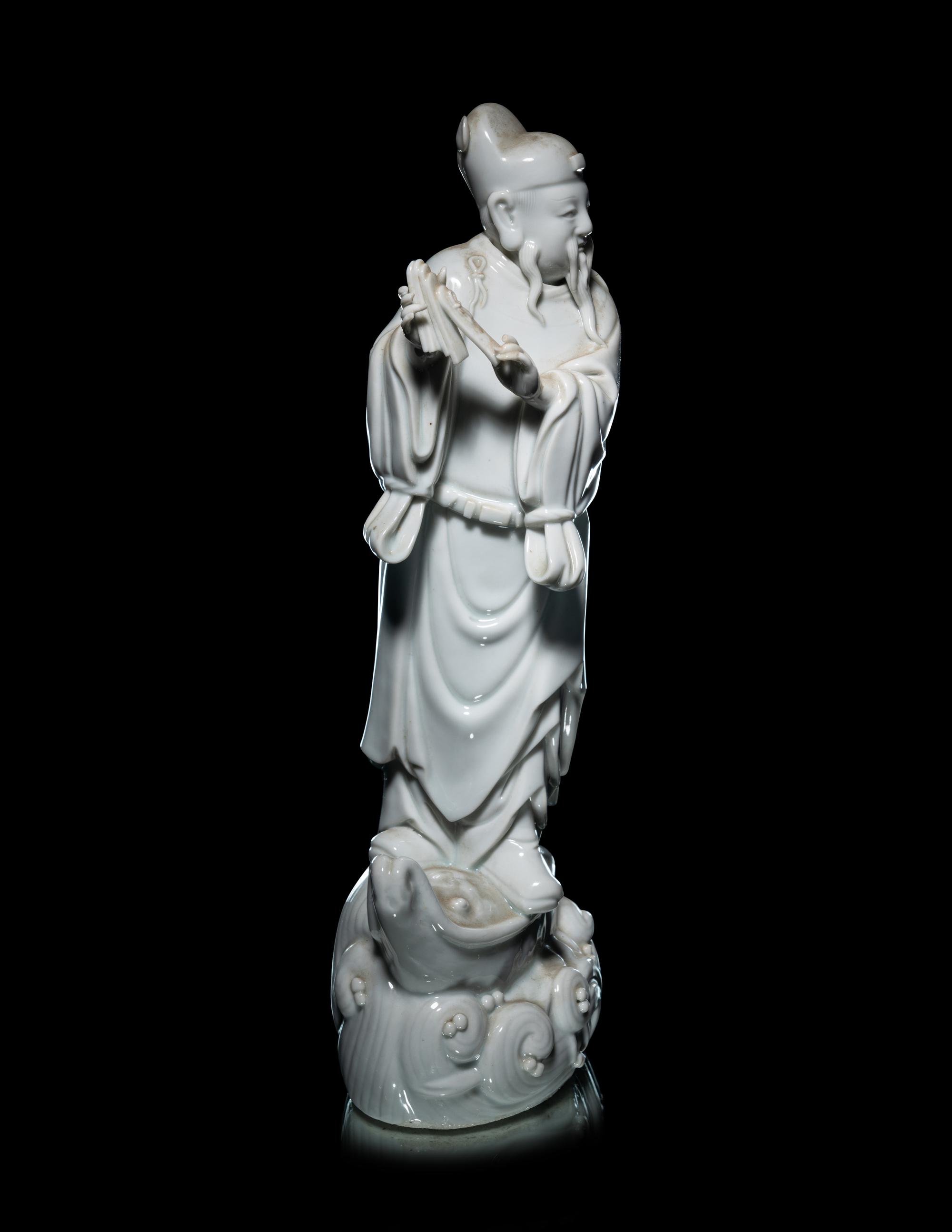 A Chinese Blanc-de-Chine Porcelain Figure of an Official