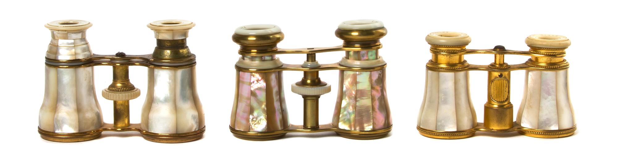 Three Pairs of French Mother-of-Pearl Veneered Opera Glasses, Width of widest 4 1/8 inches.