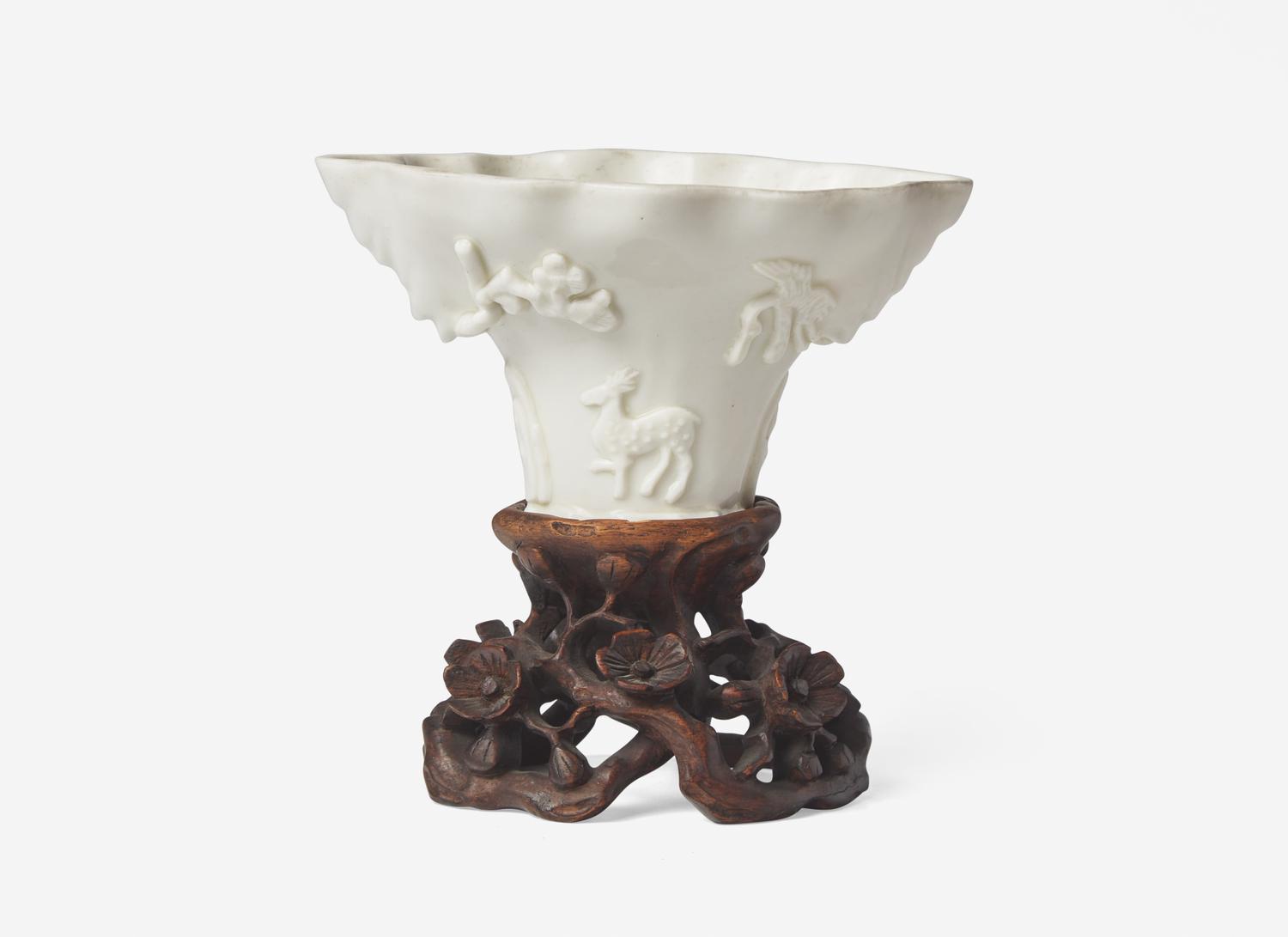 Three Chinese Dehua Porcelain Libation Cups and a Wood Stand