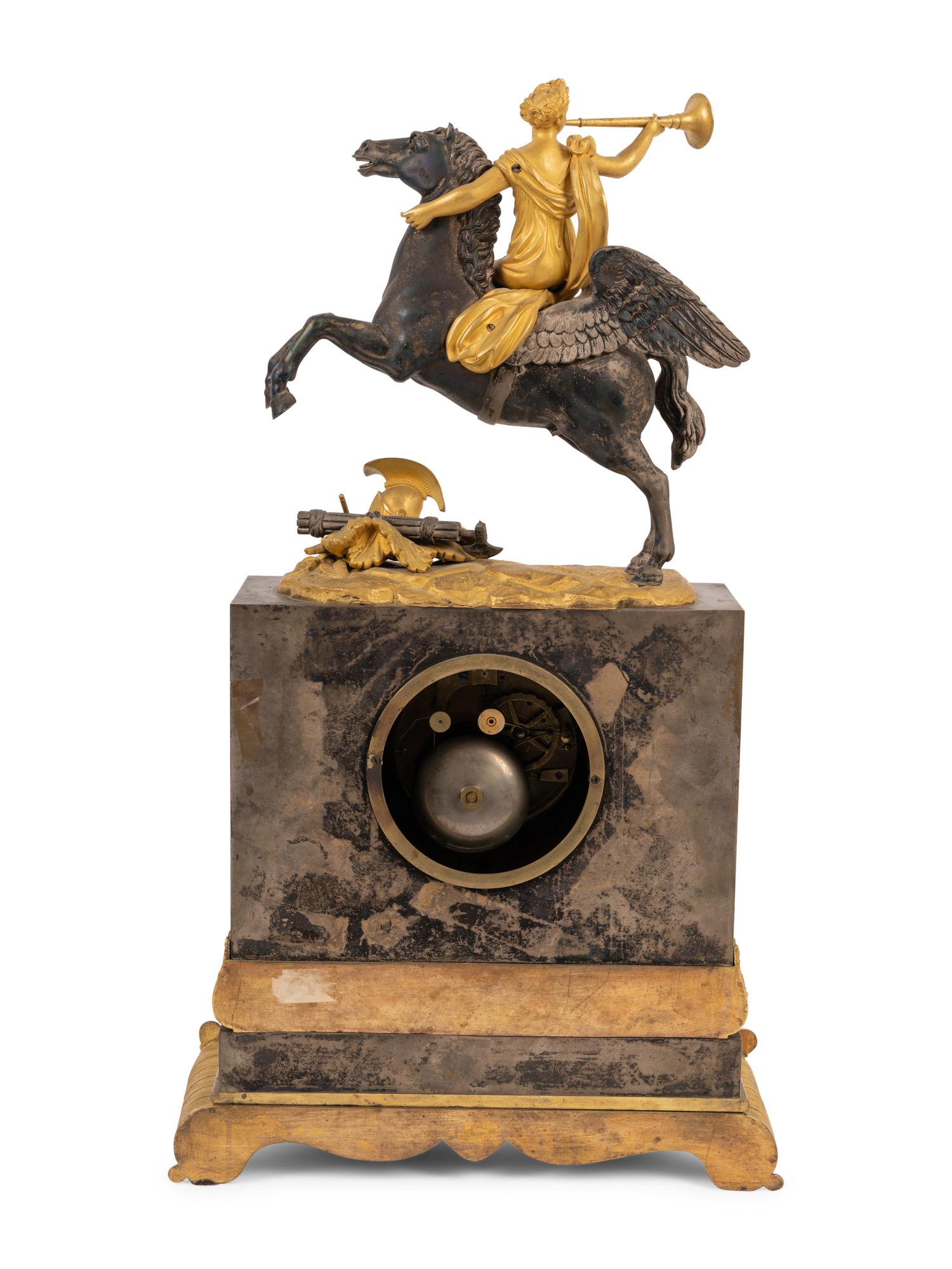 A Louis Philippe Gilt Bronze and Steel Figural Mantel Clock