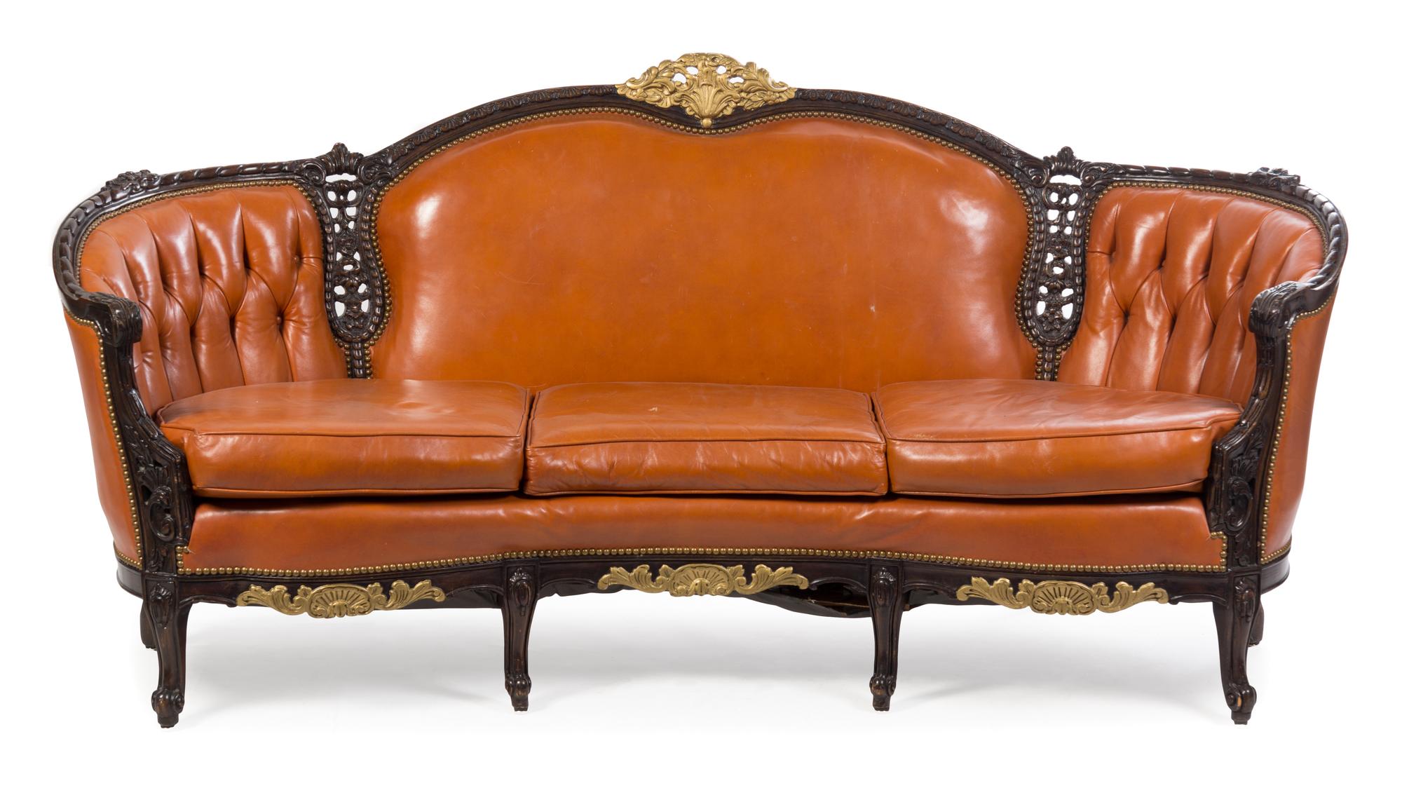 A Louis XV Style Parcel Gilt Parlor Suite Height 37 1/2 x width 80 x depth 34 inches.