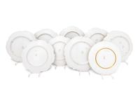 A Set of Eight Limoges Porcelain Fish and Game Plates