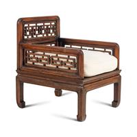 A Pair of Indonesian Carved Hardwood Armchairs
