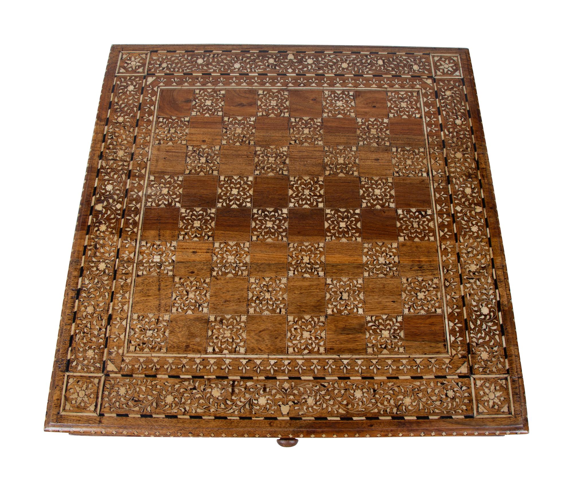 An Anglo-Indian Inlaid Teak & Satinwood Game Table