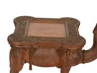 A Middle Eastern Carved Oak Camel-Form Side Table
