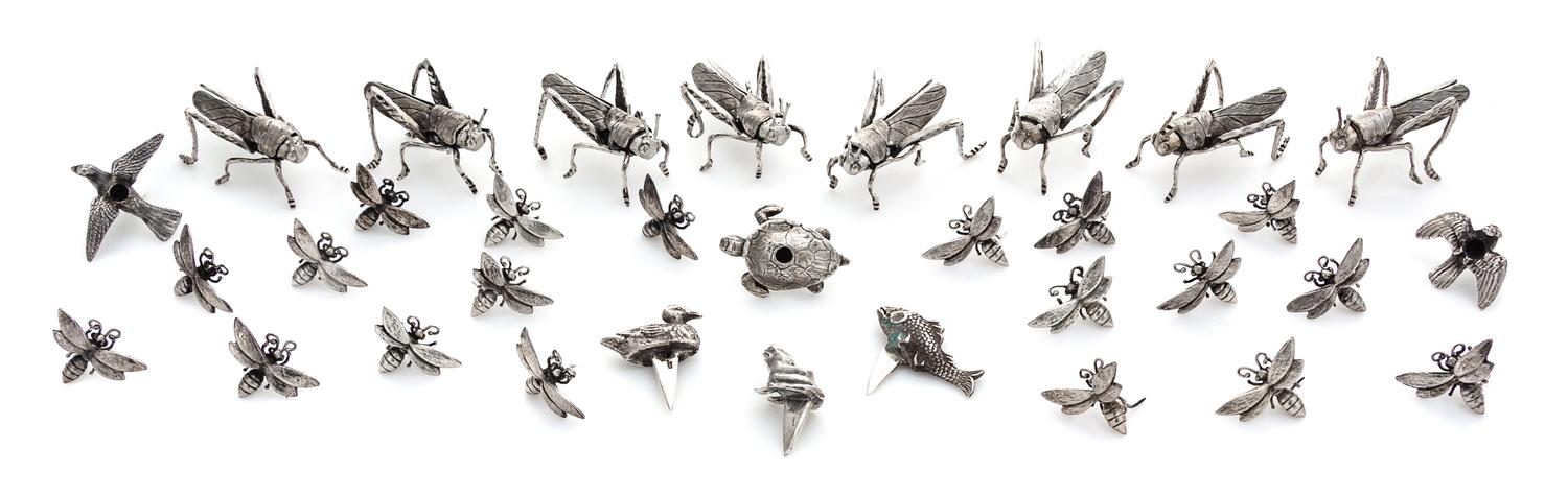 A Group of Silver Zoomorphic Table Articles, various makers, comprising a set of eight Grasshopper-form placecard holders, a set of six