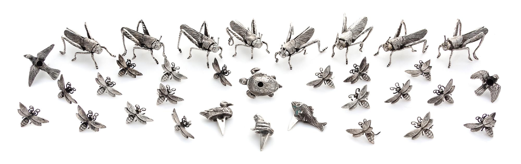 A Group of Silver Zoomorphic Table Articles, various makers, comprising a set of eight Grasshopper-form placecard holders, a set of six