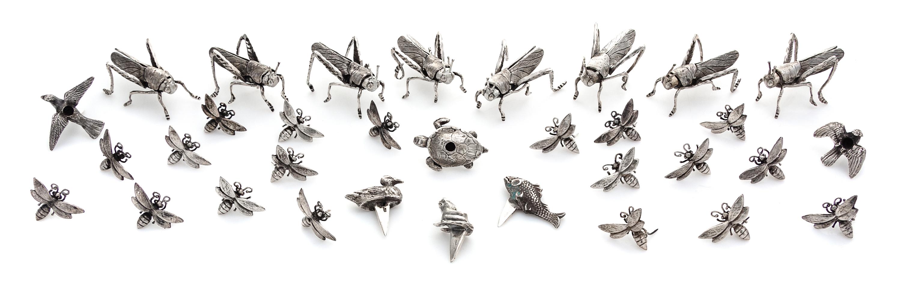 A Group of Silver Zoomorphic Table Articles, various makers, comprising a set of eight Grasshopper-form placecard holders, a set of six