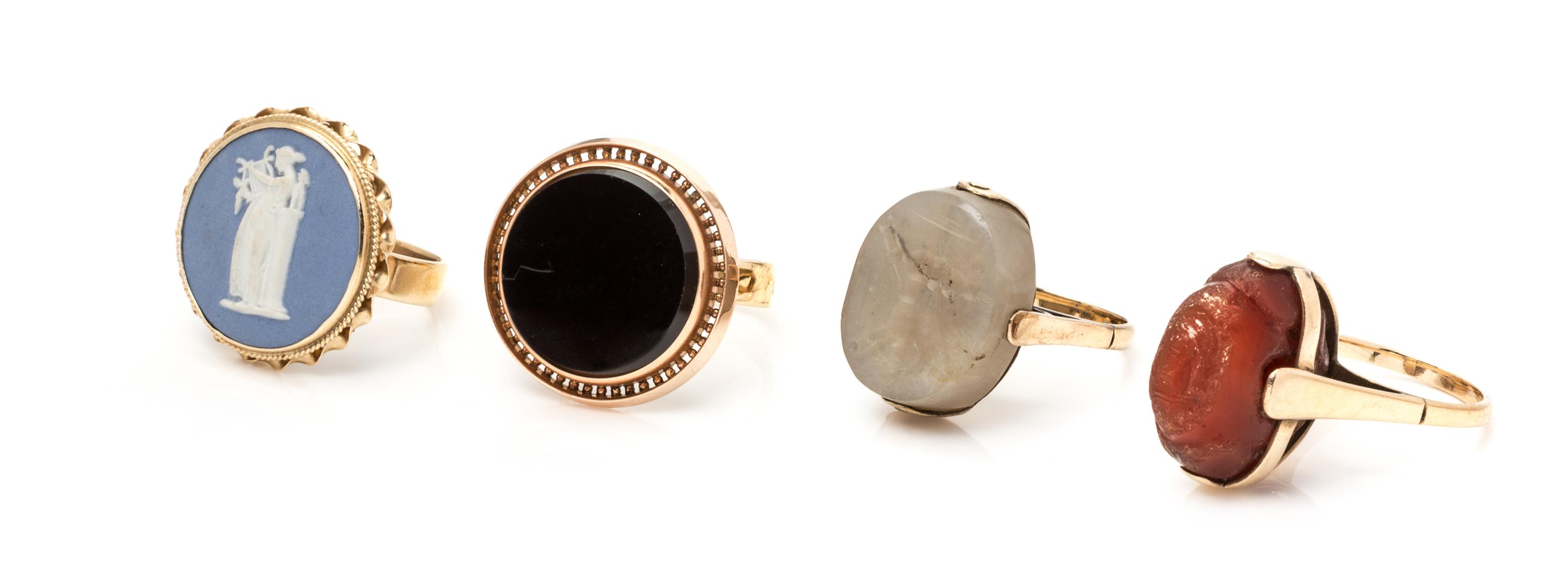 A Collection of Yellow Gold and Carved Archaic Intaglio, Onyx and Intaglio Rings, 18.80 dwts.