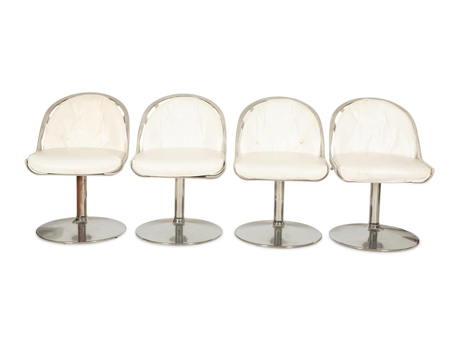 A Russell Woodard Dining Table with Four Chairs