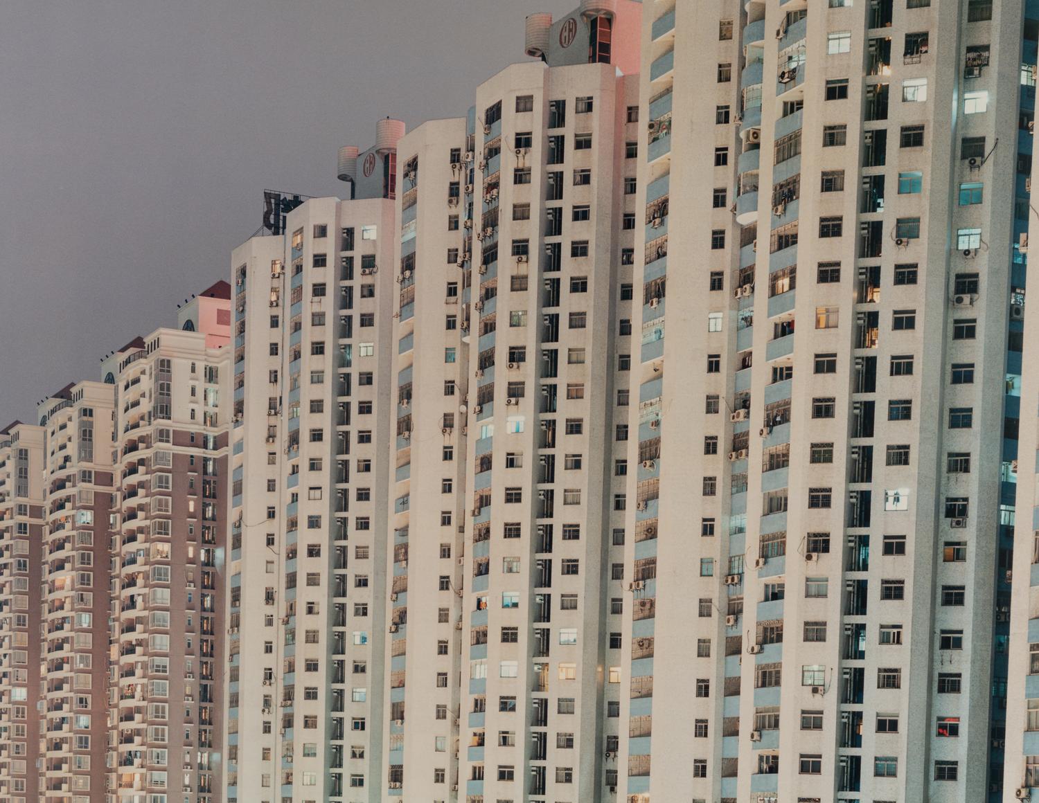 Peter Bialobrzeski (born 1961) Shenzen (gray sky, buildings on diatonal), from the series "Neon Tigers", 2001