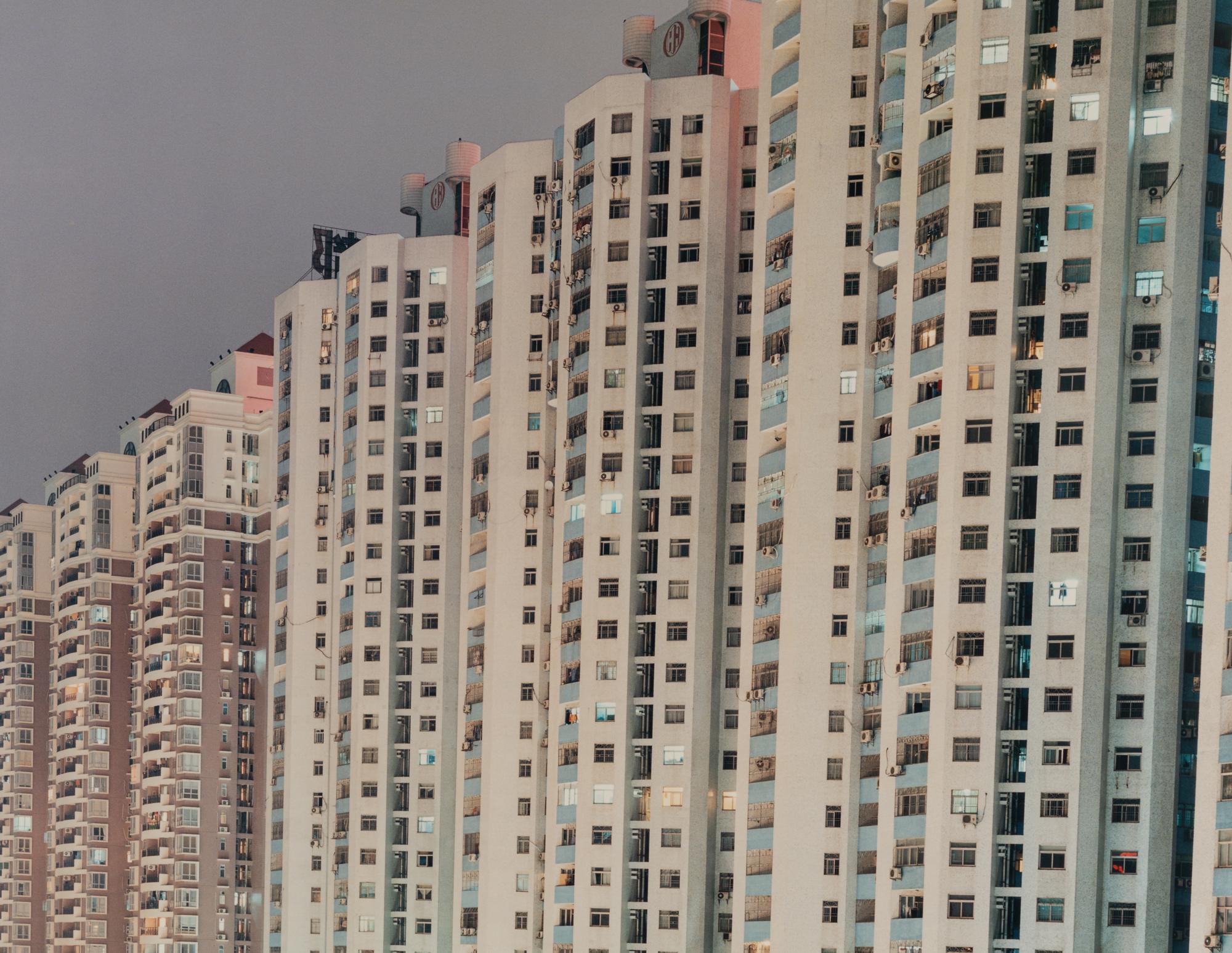 Peter Bialobrzeski (born 1961) Shenzen (gray sky, buildings on diatonal), from the series "Neon Tigers", 2001