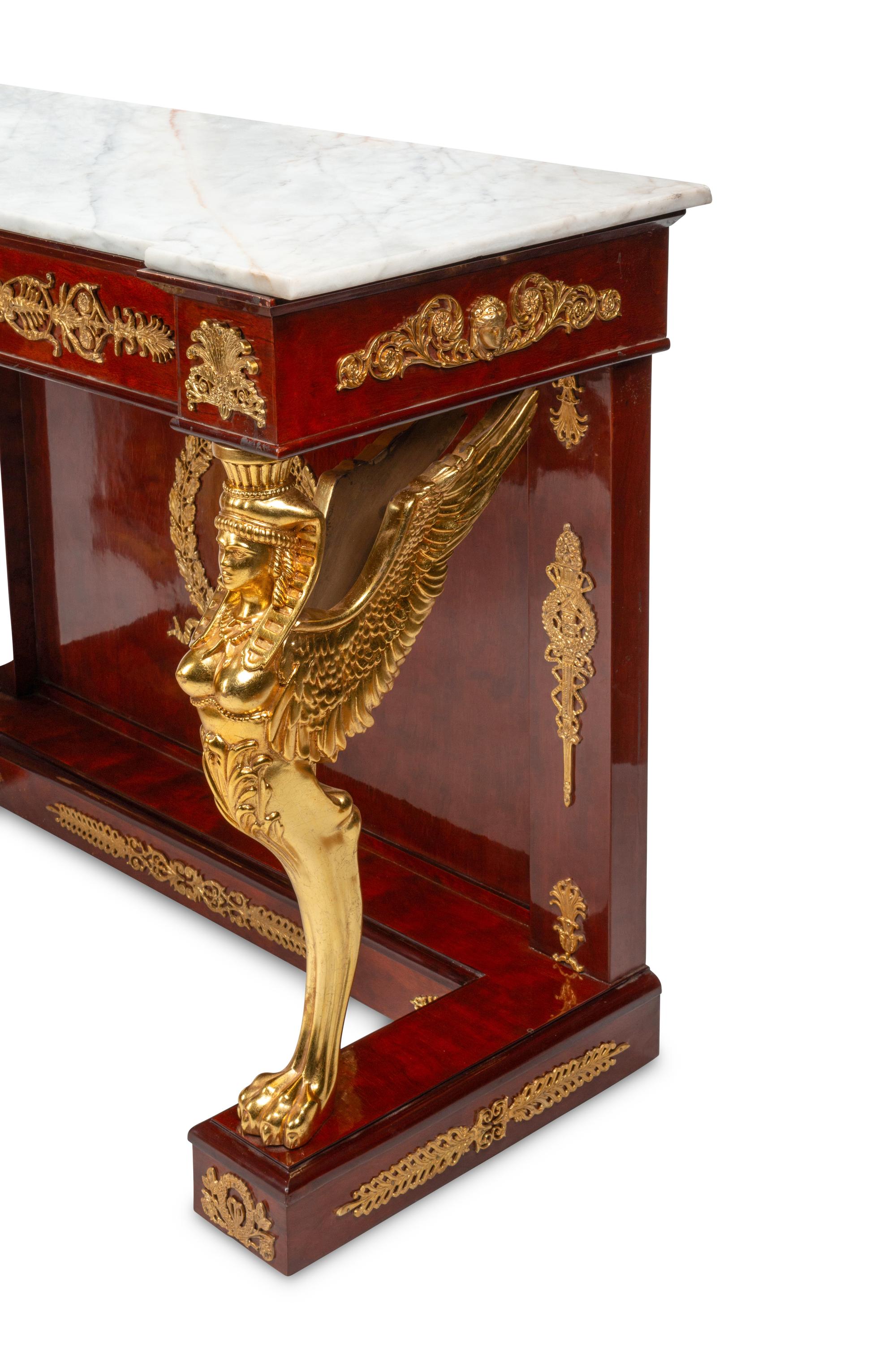 A Pair of Empire Style Gilt Metal Mounted Walnut Marble-Top Pier Tables