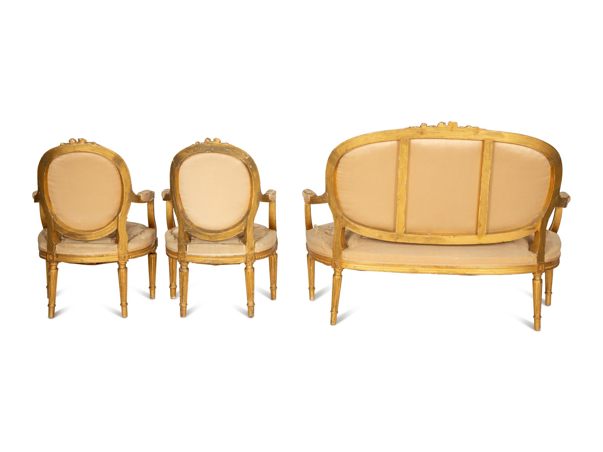 A Louis XVI Style Giltwood Three-Piece Seating Suite