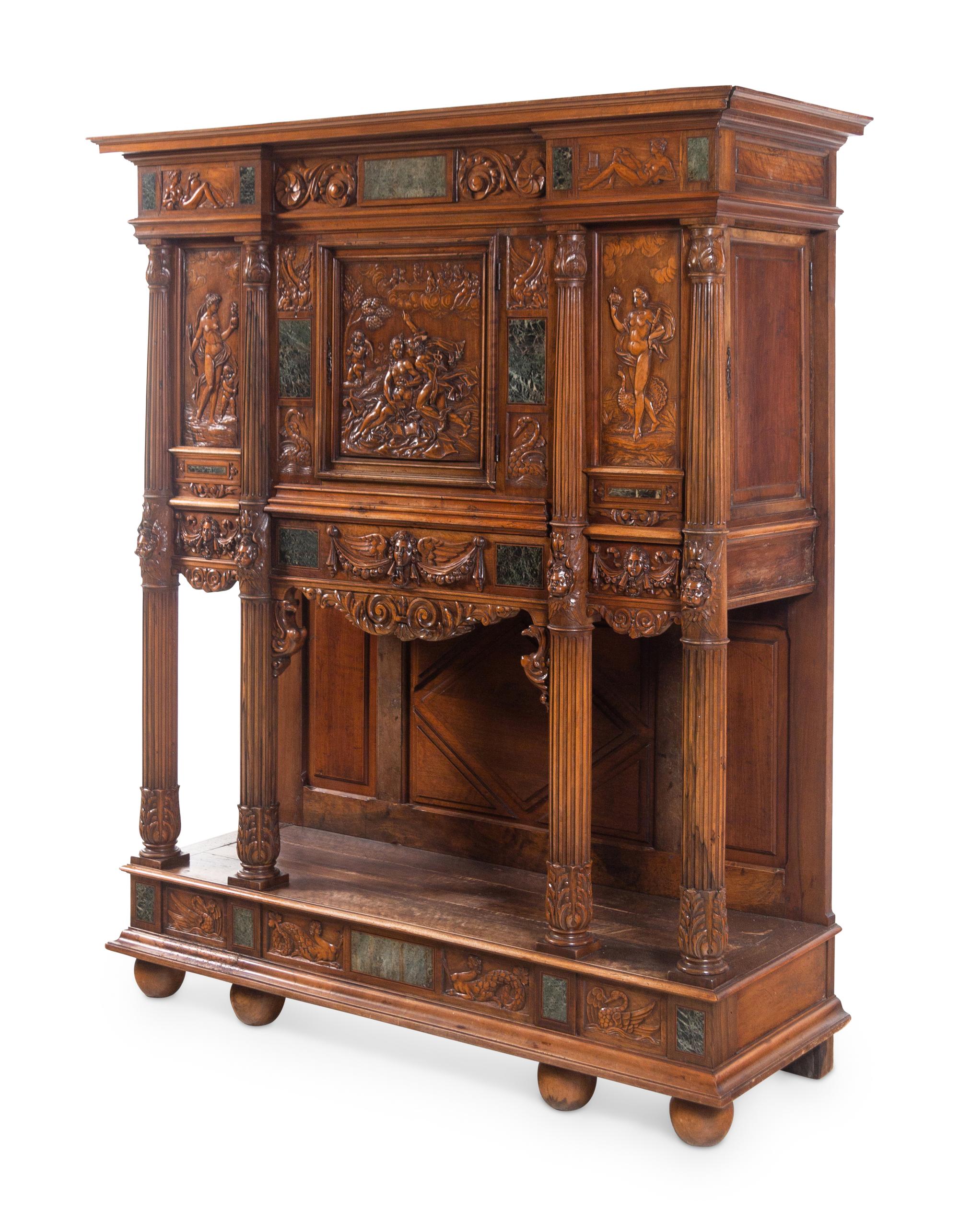 A French Renaissance Revival Carved Walnut and Marble-Inset Court Cupboard