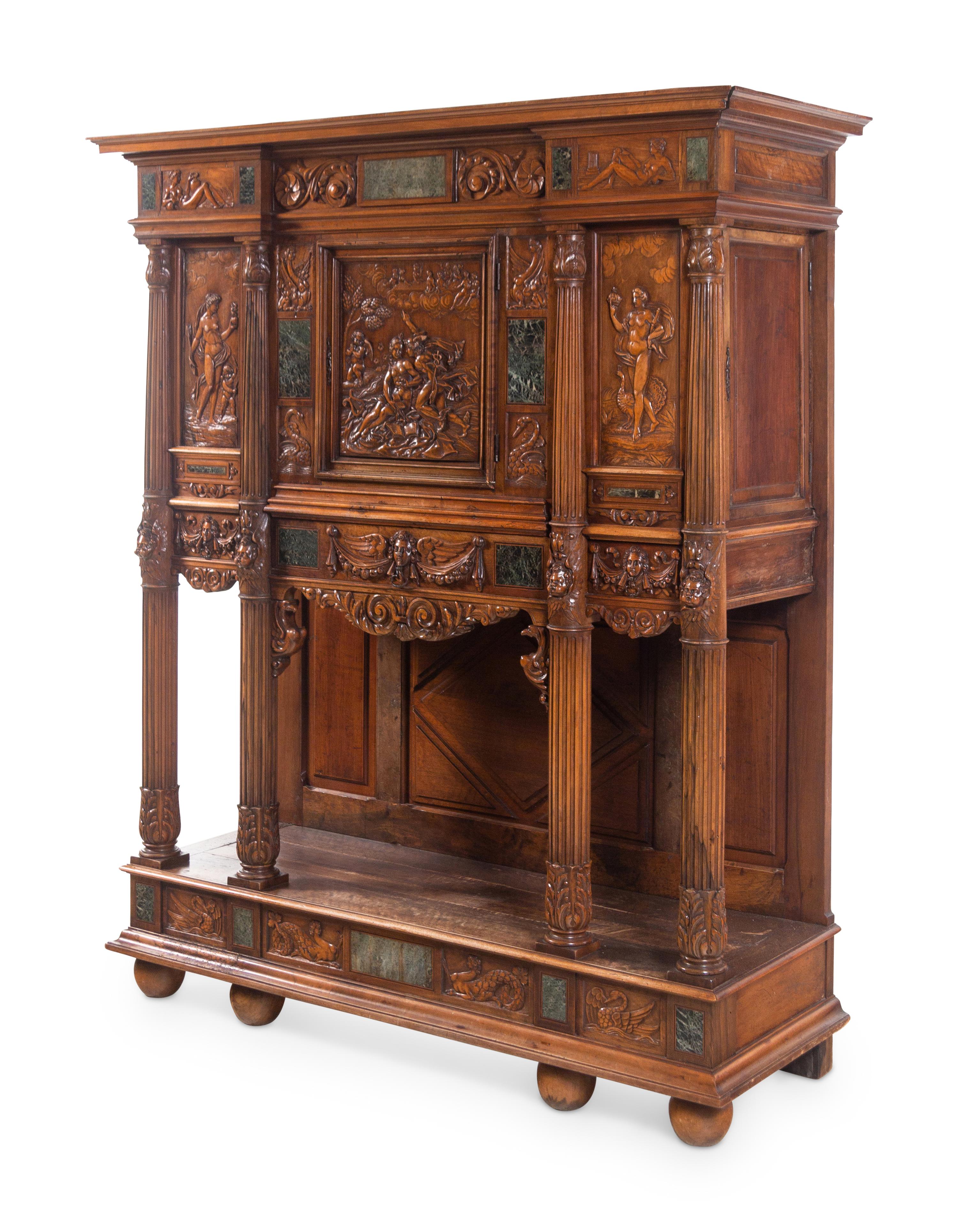 A French Renaissance Revival Carved Walnut and Marble-Inset Court Cupboard