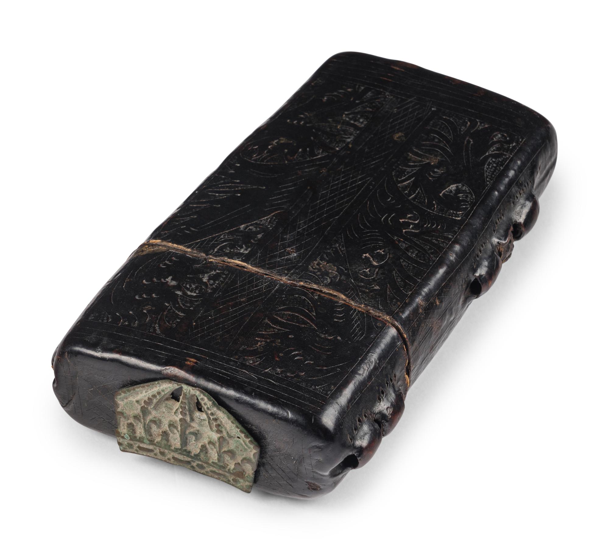 A BOOK BOX Book box, dark brown cuir-ciselé tooled leather [Austria (?), c. 1475-1500]