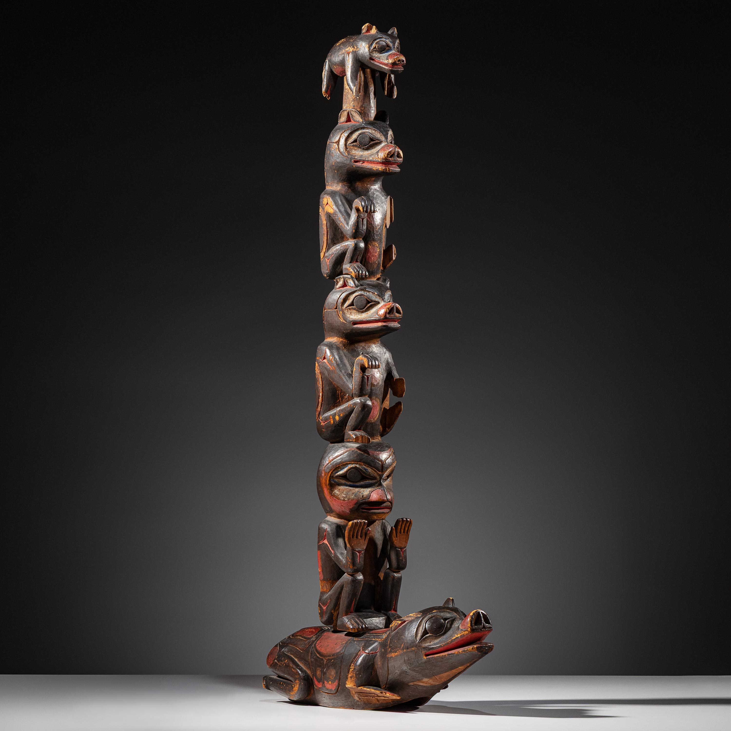 Haida Carved Totem Pole and Bear Cub