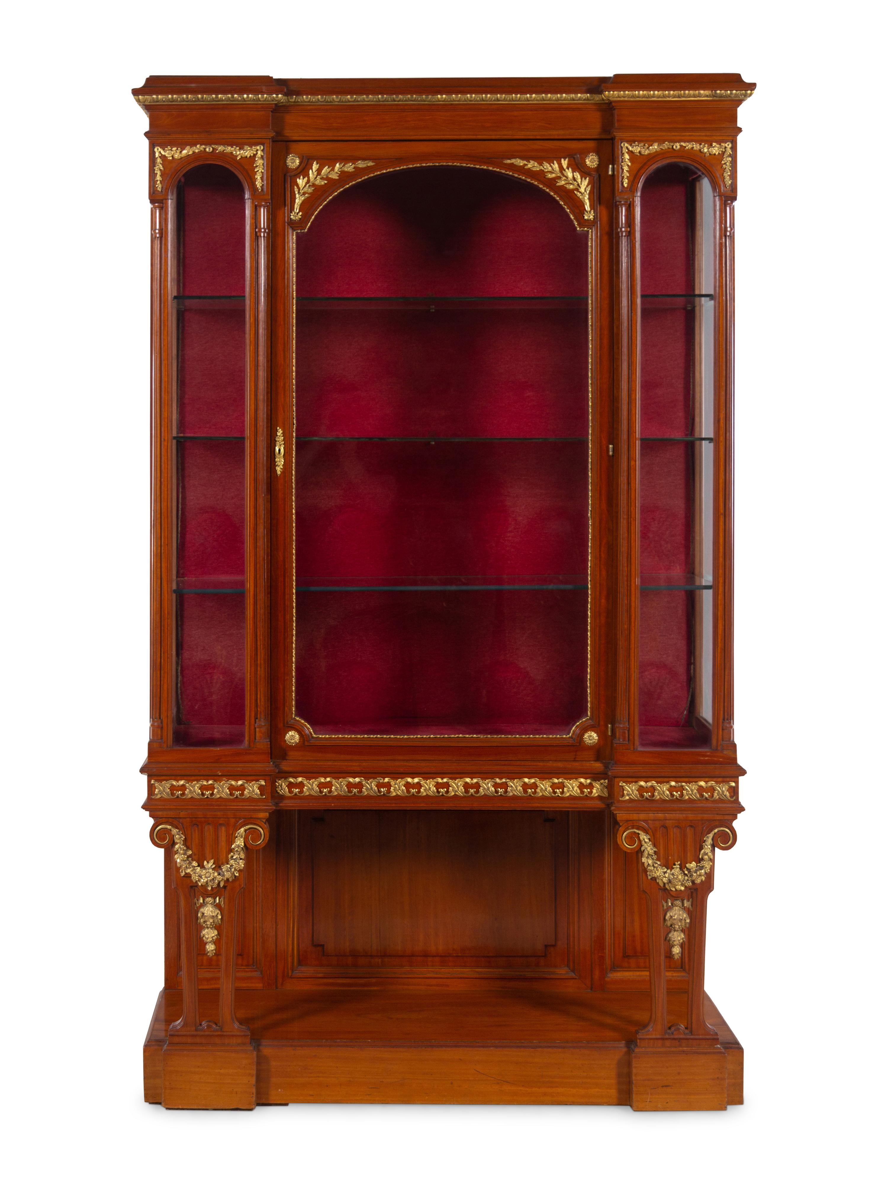 A Pair of Louis XVI Style Gilt Bronze and Metal Mounted Walnut Vitrine Cabinets
