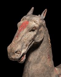 A Grey Pottery Figure of a Horse