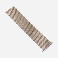 A bicolor fourteen karat gold and diamond bracelet