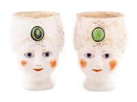A Pair of Khrapunov-Novykh Porcelain Figural Mugs