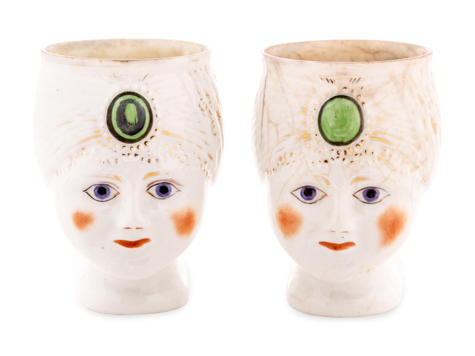 A Pair of Khrapunov-Novykh Porcelain Figural Mugs