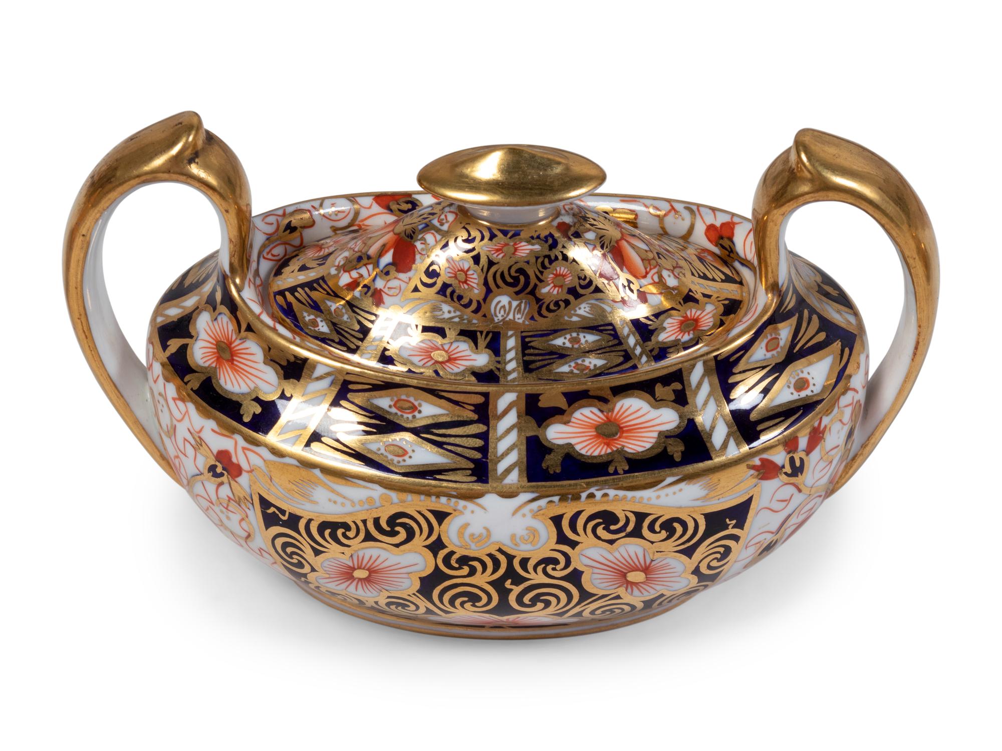 A Royal Crown Derby Porcelain Dinner Service