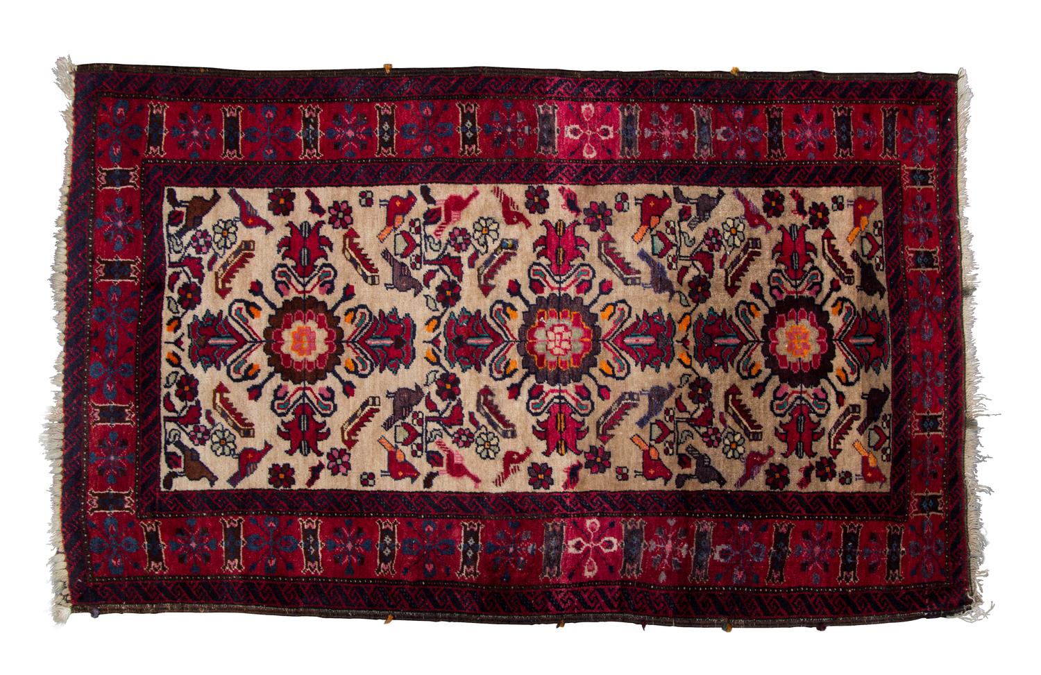 A Sarouk Wool Rug 4 feet 11 x 3 feet 1/2 inches.