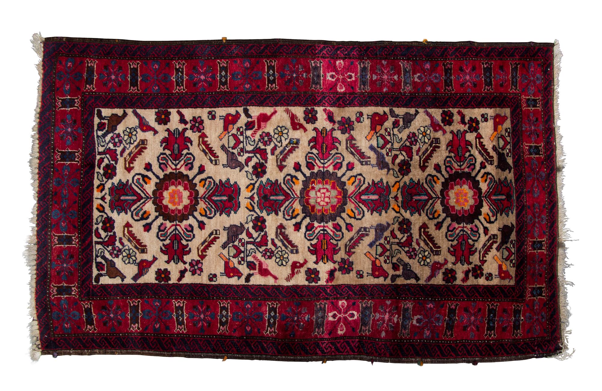 A Sarouk Wool Rug 4 feet 11 x 3 feet 1/2 inches.