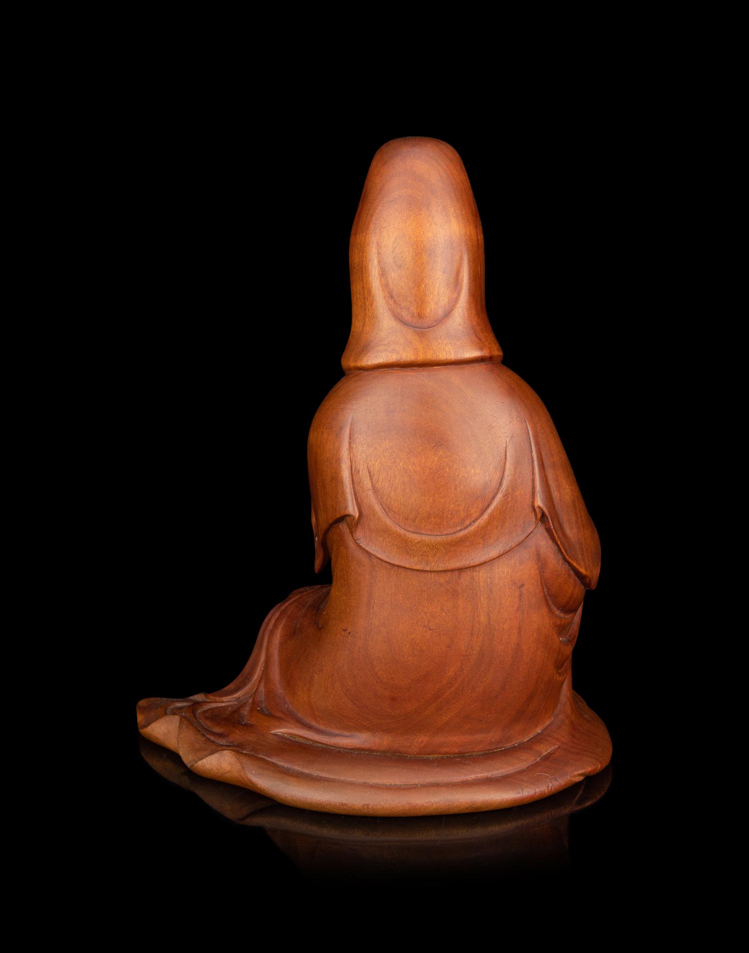 A Japanese Carved Boxwood Figure of Kannon
