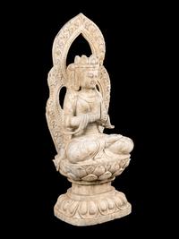 A Chinese Carved Stone Seated Guanyin Figure