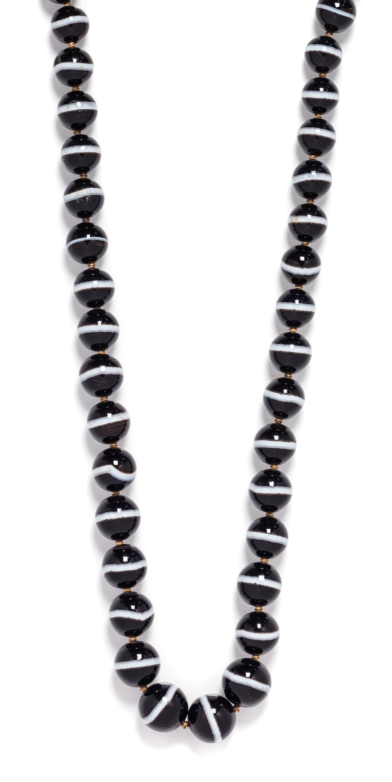 A Single Strand Graduated Banded Onyx Bead Necklace,