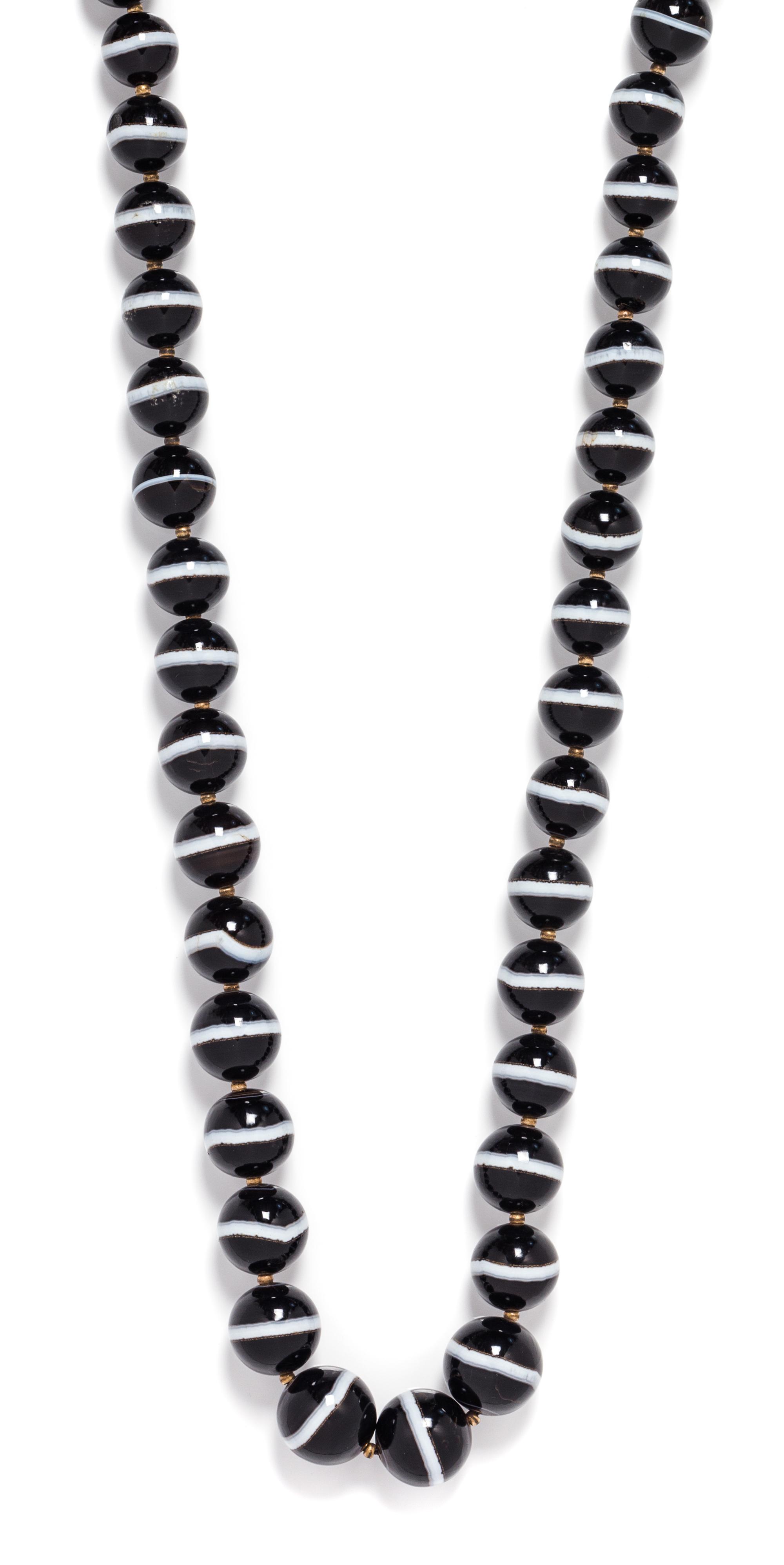 A Single Strand Graduated Banded Onyx Bead Necklace,