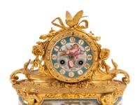 A French Gilt Bronze and Sèvres Style Porcelain Mantel Clock