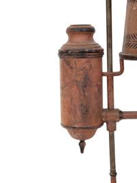 A French Tôle Peinte and Cast Iron Oil Lamp