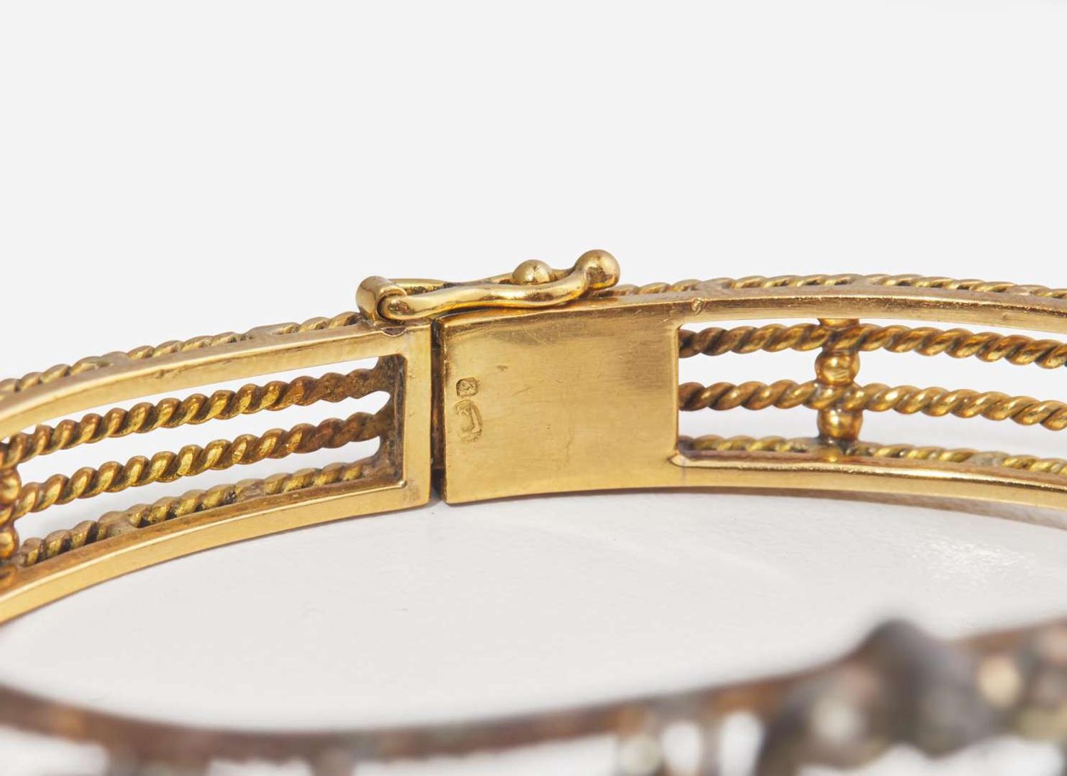 A Silver-Topped Yellow Gold, Diamond, and Emerald Bracelet