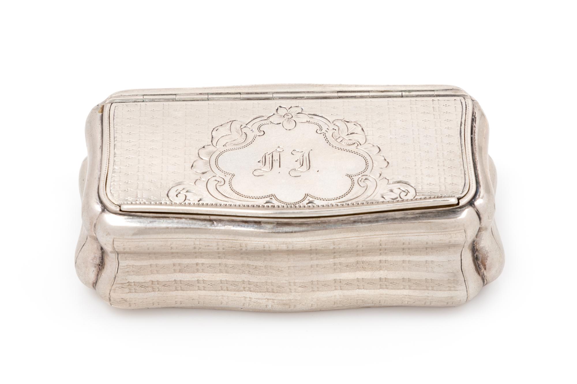 An Austrian Silver Snuff Box, Maker's Mark Obscured, Vienna, Late 19th/Early 20th Century, of rectangular bombe form with engine-turned