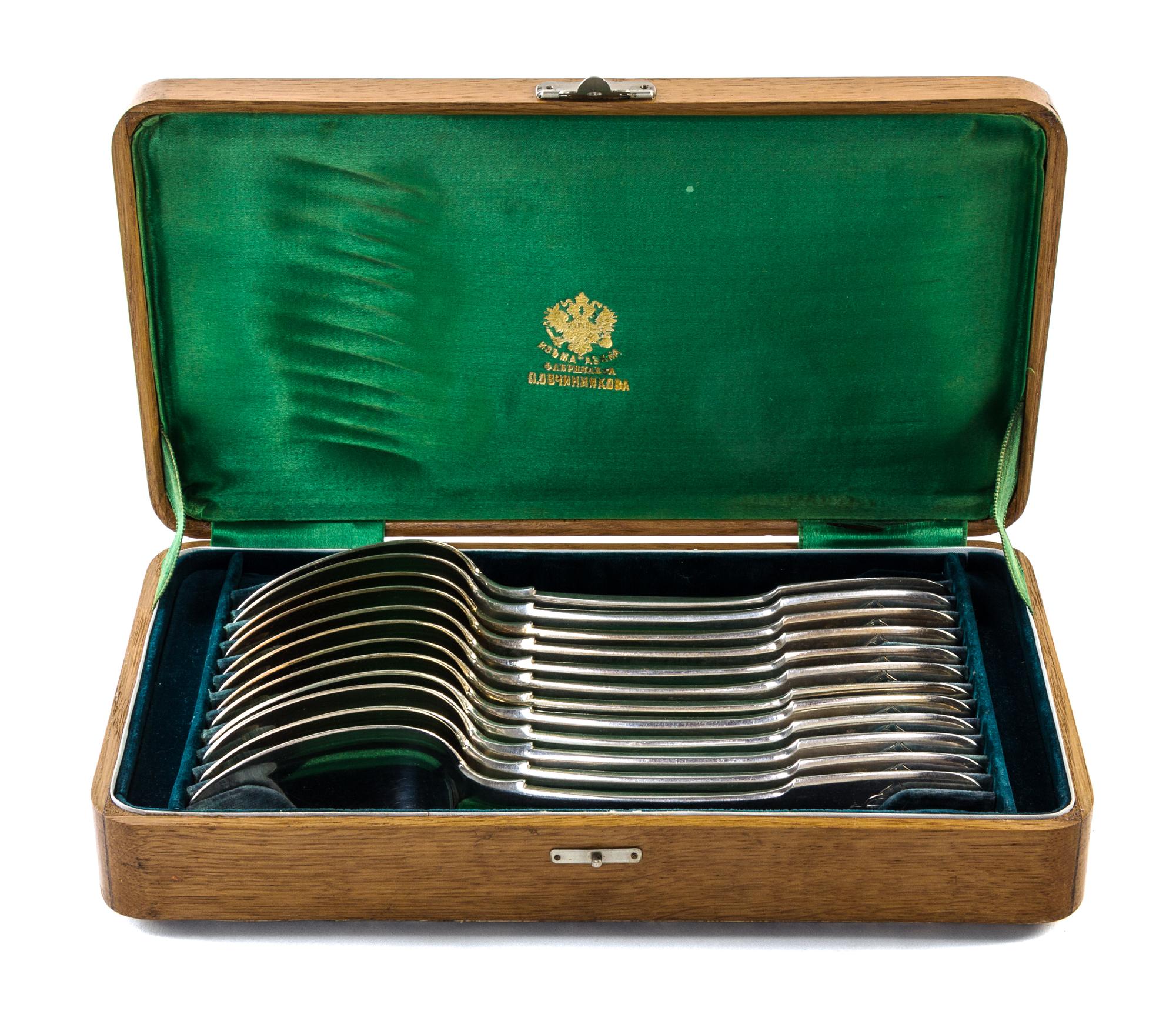 A Set of Twelve Russian Silver Table Spoons, Mark of Pavel Ovchinnikov with Imperial warrant, Moscow, 19th century, the fiddle handles