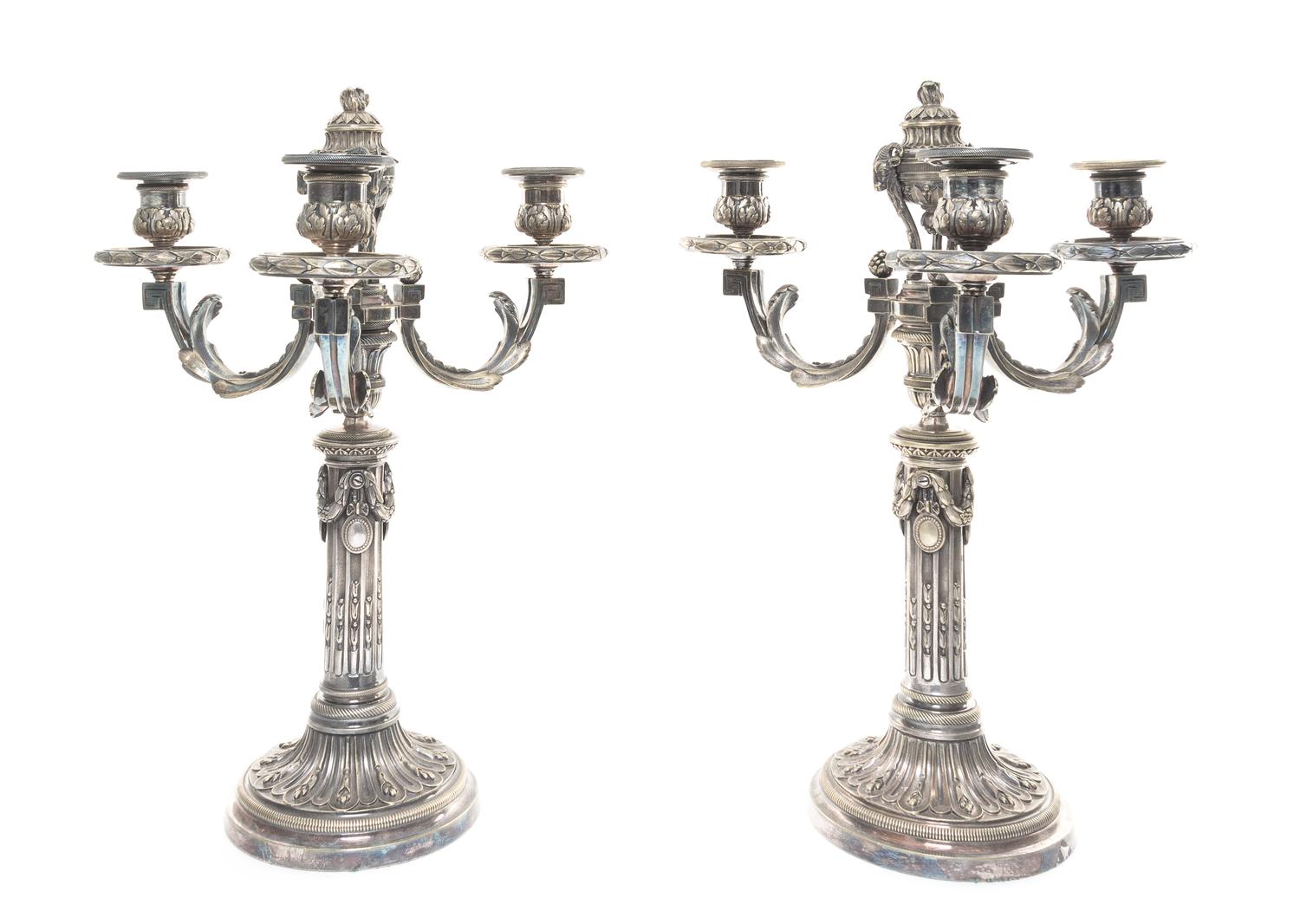 A Pair of Continental Silvered Bronze Three-Light Candelabra Height 16 1/2 inches.