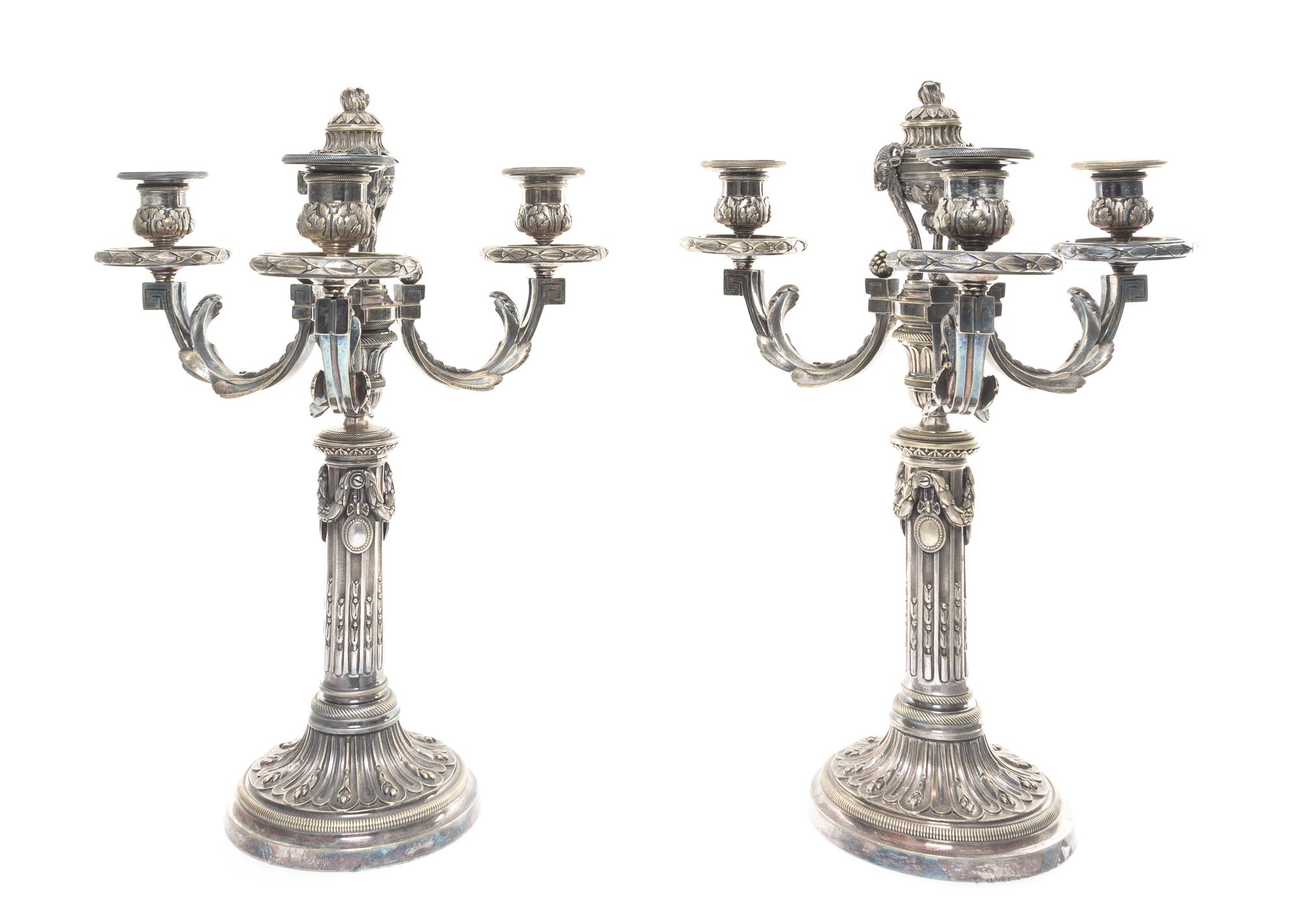 A Pair of Continental Silvered Bronze Three-Light Candelabra Height 16 1/2 inches.