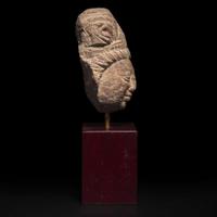 A carved stone head, possibly Shiva 石雕佛首, 或湿婆神
