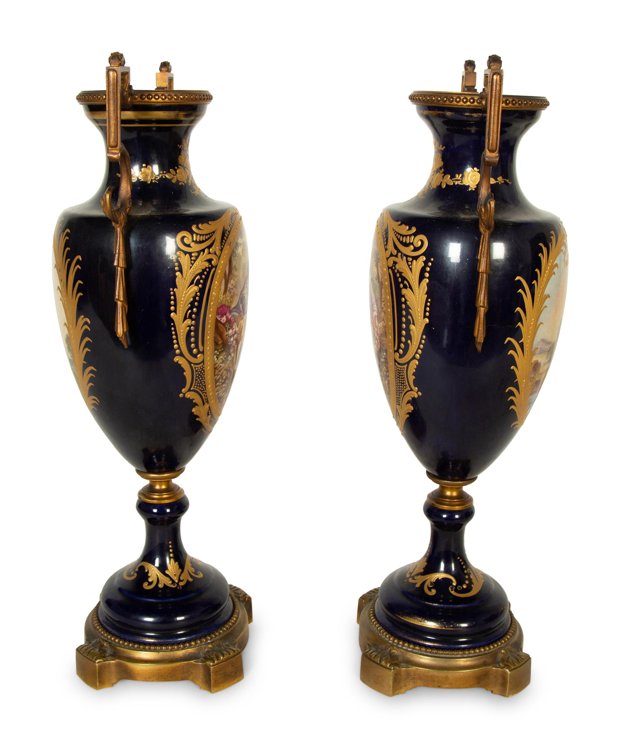 A Pair Gilt Metal Mounted Sèvres Style Porcelain Urns