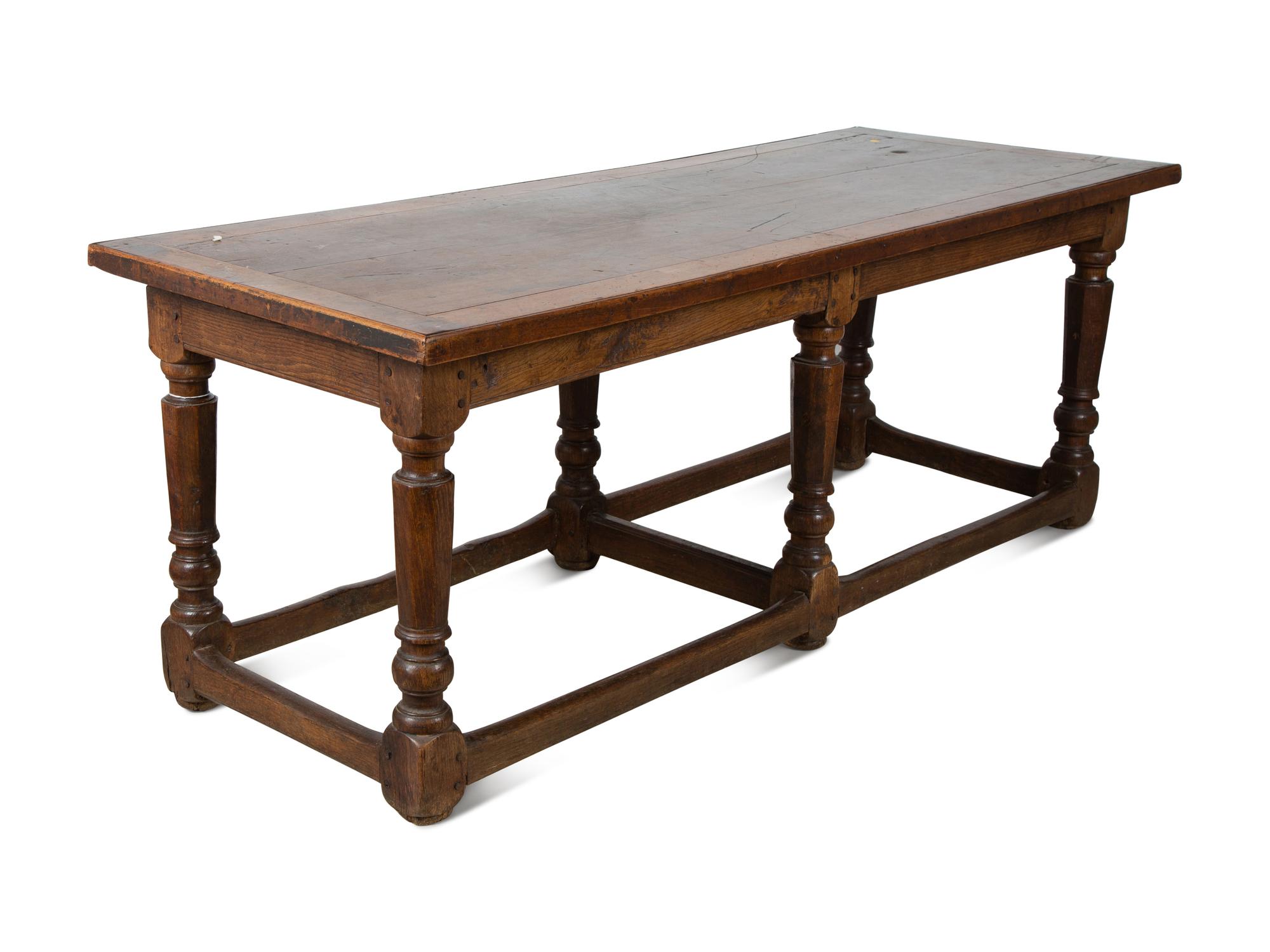 An English Walnut Tavern Table — 18TH CENTURY
