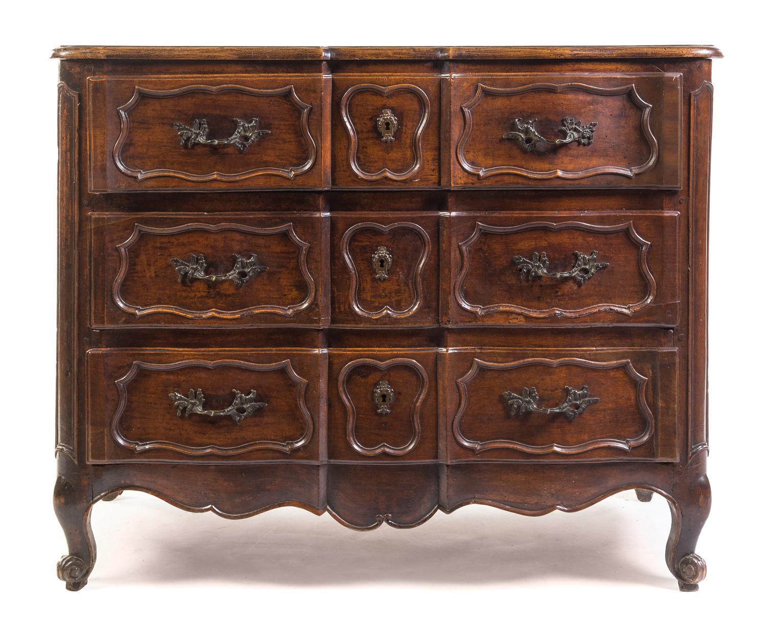 A Louis XV Provincial Walnut Commode Height 38 1/2 x width 48 1/4 x depth 23 inches. — 18TH CENTURY
