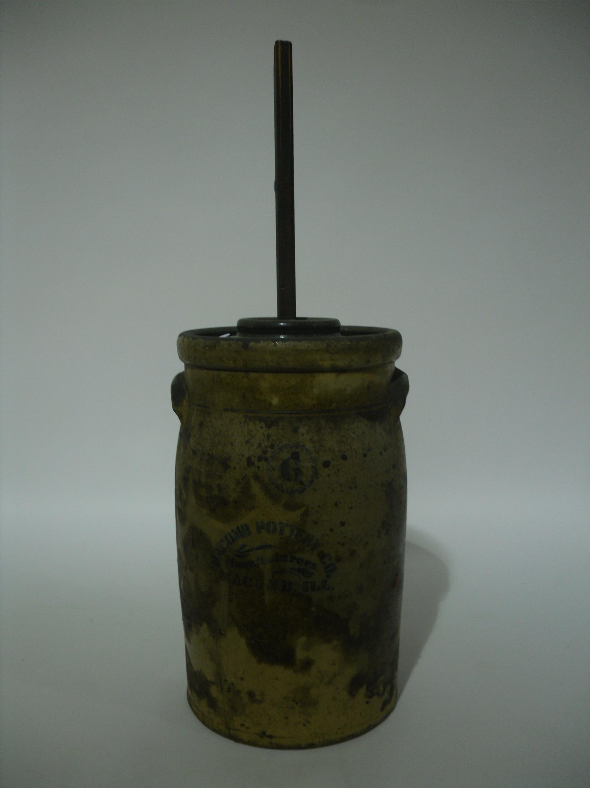 A Group of Seven Pottery Stoneware Articles Height of tallest 18 1/2 inches.