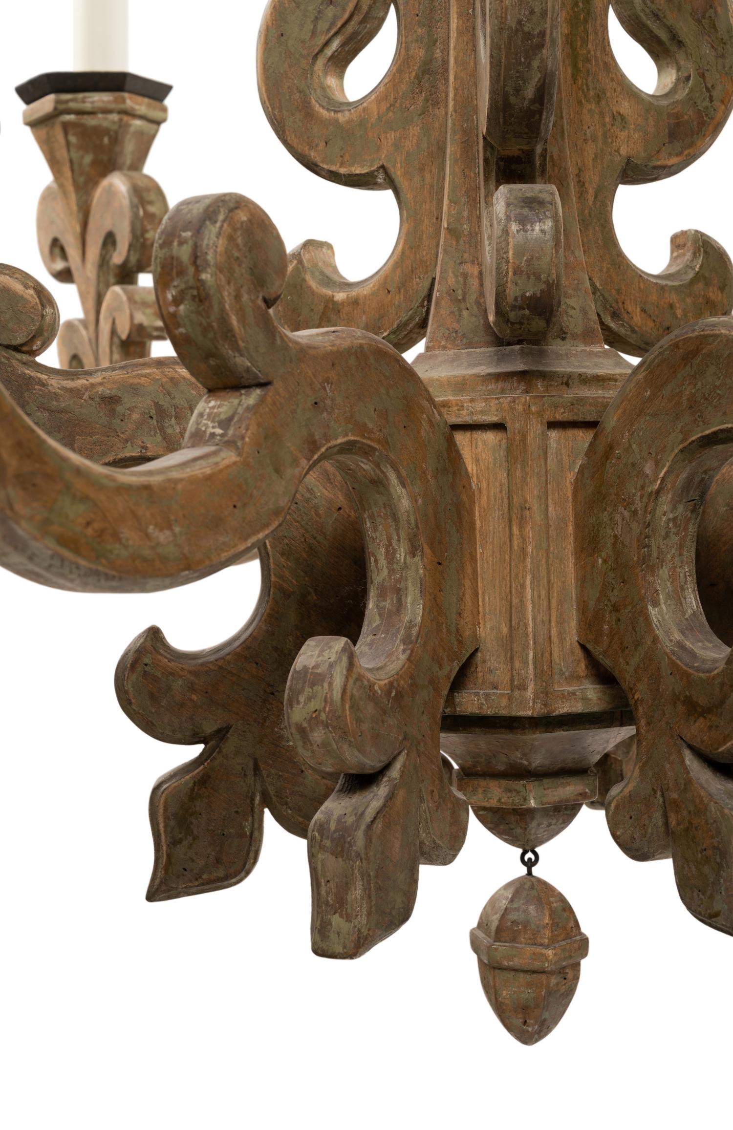 A Baroque Style Carved and Painted Six-Light Chandelier
