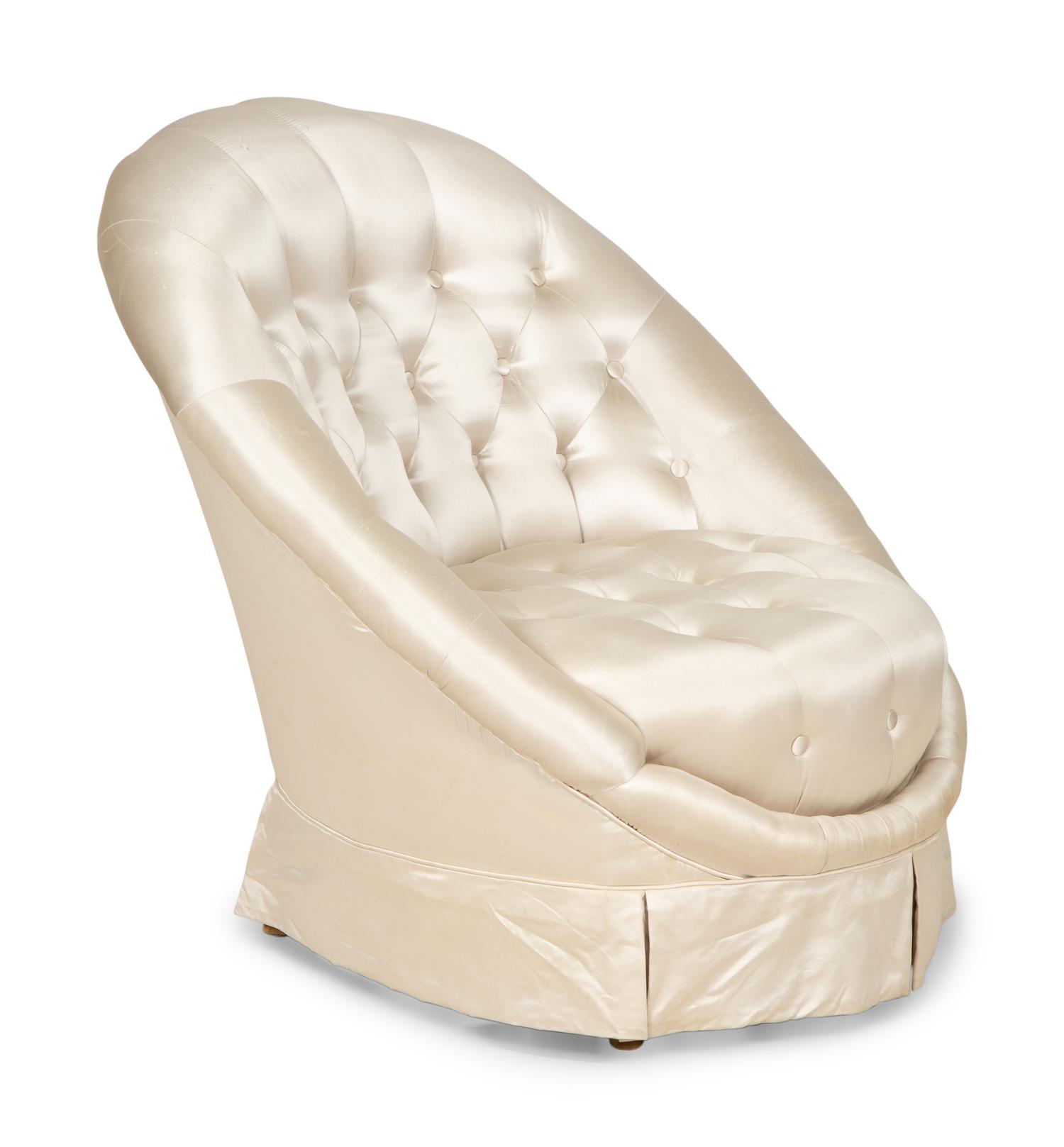A Button-Tufted Silk-Upholstered Skirted Lounge Chair