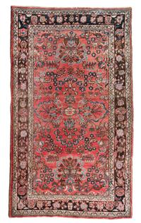 A Sarouk Wool Rug 7 feet 3 1/2 inches x 4 feet 4 3/4 inches.
